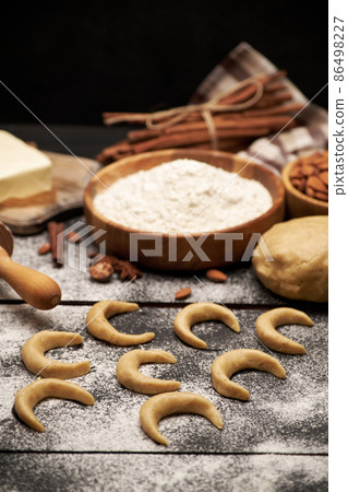 Cooking traditional German or Austrian Vanillekipferl vanilla kipferl cookies Cooking traditional German or Austrian Vanillekipferl vanilla kipferl cookies 86498227