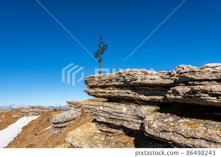 Rock Karst Formations and Religious Cross on Lessinia Plateau Veneto Italy 86498243