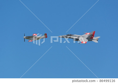 Swiss Air Force P-51D Mustang and F / A-18C Hornet formation flight Swiss Air Force P-51D Mustang and F / A-18C Hornet formation flight 86499116
