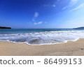 Blue sky, sea and beautiful sandy beach 86499153
