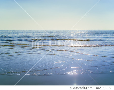 Calm blue sea and sky 86499229