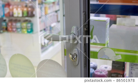 Plastic door handle in the store closeup Plastic door handle in the store closeup 86501978