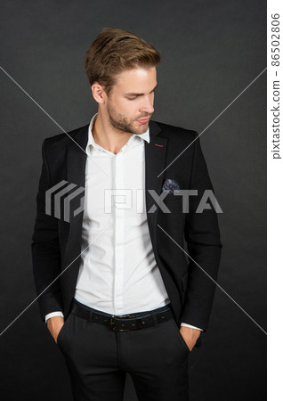 young guy in suit on black background, fashion young guy in suit on black background, fashion 86502806