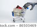 robot arm pushes a supermarket cart. white background, free space. technology future, artificial intelligence in trade  86503469