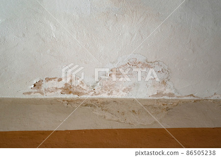 Rain water infiltration and leak inside a home building roof 86505238