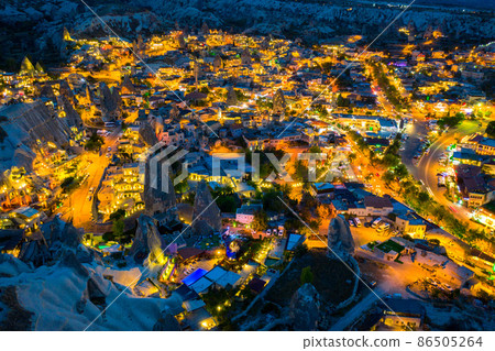 Goreme town at twilight in Cappadocia, Turkey. 86505264