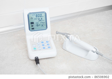 dental equipment in the dentist's office for root canal treatment. Close-up, endomotor dental equipment in the dentist's office for root canal treatment. Close-up, endomotor 86506902