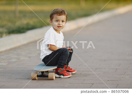 Cute little boy have fun on a playground Cute little boy have fun on a playground 86507006