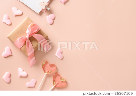 Valentine's day blank for love letter, two lollipops and pink hearts. 86507109