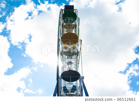 Ferris wheel in an amusement park 86512661