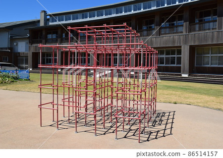 Playground equipment installed in the elementary school yard 86514157