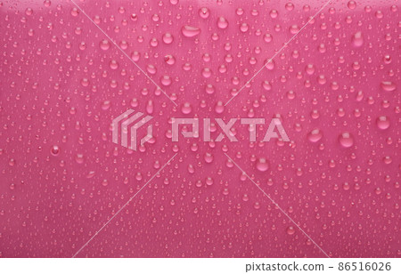 Water drops on pink background, top view 86516026