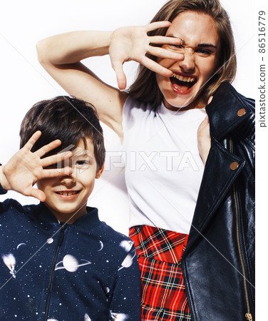 lifestyle and people concept, little cute boy with teenage girl posing together cheerful happy smiling isolated on white background 86516779