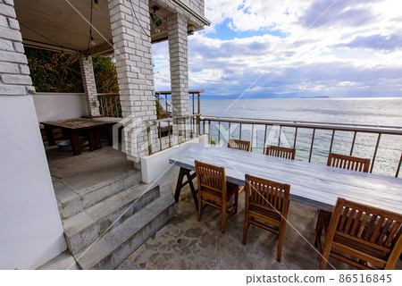 Fashionable terrace seats facing the sea Fashionable terrace seats facing the sea 86516845