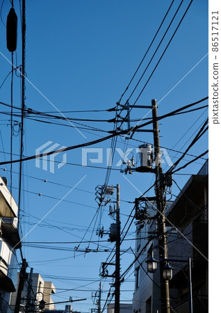 Utility poles and wires Utility poles and wires 86517121