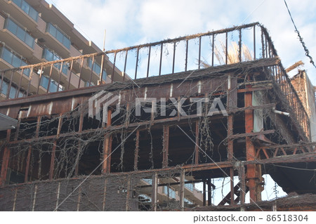 Abandoned house with ivy entwined 86518304
