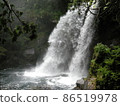 Huge waterfall of Nino Falls. A roaring sound echoes throughout the valley. 86519978