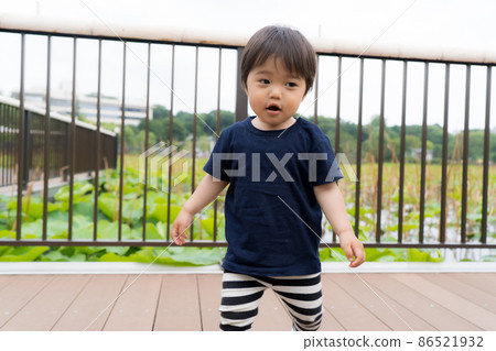 2-year-old child playing in the park 2-year-old child playing in the park 86521932