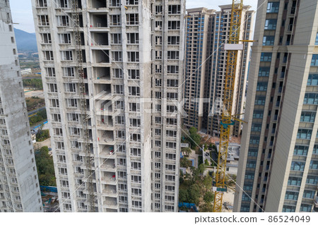 Aerial view of apartment construction site in China 86524049