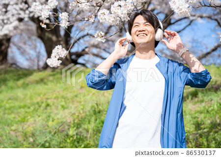 Man enjoying music Man enjoying music 86530137