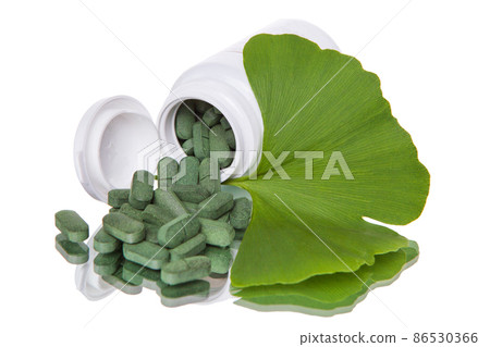 Ginko biloba tablets on white background, Isolated. 86530366