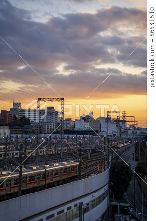 Saginuma Station and marshalling yard on the Tokyu line at sunset 86531510