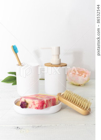 Toiletries and personal hygiene products on white background in bathroom Toiletries and personal hygiene products on white background in bathroom 86532544