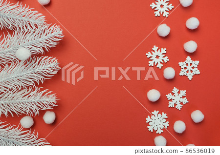 Christmas and Happy New Year greeting card with frame line of snowflakes and white branches on red backgroun. Xmas holiday postcard with place for your text Christmas and Happy New Year greeting card with frame line of snowflakes and white branches on red backgroun. Xmas holiday postcard with place for your text 86536019