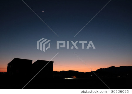 Crescent moon at dusk 86536035