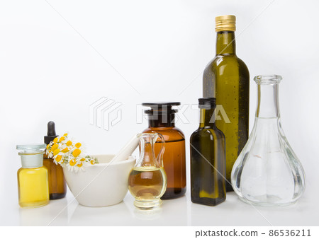 Set bottles of essential oil, white background. Healthy cosmetics concept. 86536211