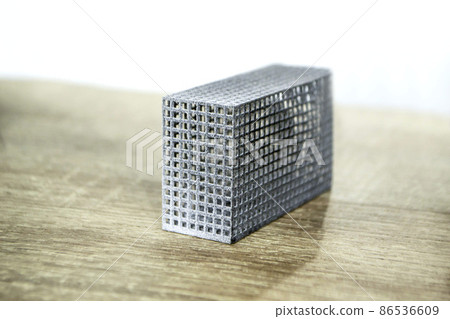 Gray abstract models printed on 3d printer from powder close-up. Gray abstract models printed on 3d printer from powder close-up. 86536609