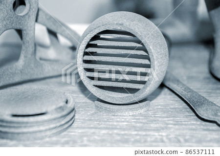 Gray object printed on powder industrial 3D printer Three-dimensional volumetric Gray object printed on powder industrial 3D printer Three-dimensional volumetric 86537111
