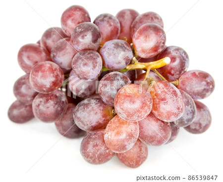 A large bunch of red large grapes on a white background 86539847