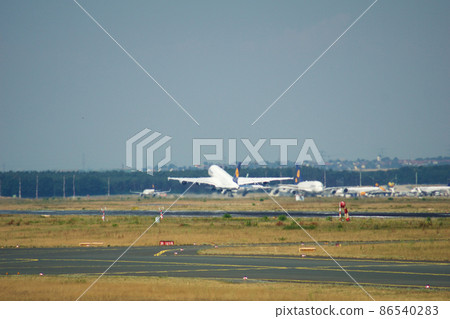 FRANKFURT, GERMANY - JUN 09th, 2017: Lufthansa Airbus A380 MSN 66 - D-AIMF aircraft takeoff from the airport. A380 is the flagship of Lufthansas airplane fleet FRANKFURT, GERMANY - JUN 09th, 2017: Lufthansa Airbus A380 MSN 66 - D-AIMF aircraft takeoff from the airport. A380 is the flagship of Lufthansas airplane fleet 86540283