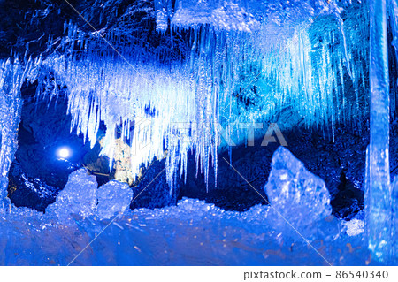 Icicles in the Narusawa Ice Cave 86540340