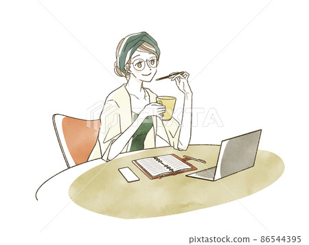 A woman working with a notebook or computer on the table 86544395