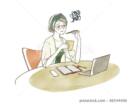 A woman working with a notebook or computer on the table 86544406