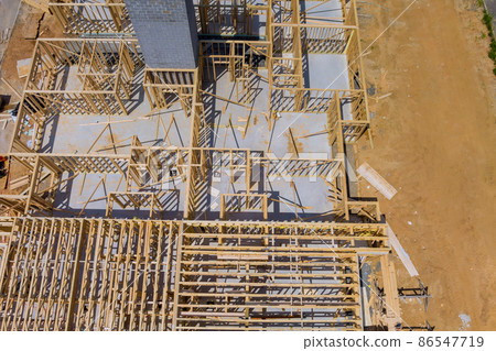 Apartment building wood second floor joist in a new construction site Apartment building wood second floor joist in a new construction site 86547719