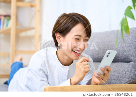Female smartphone living room interior Female smartphone living room interior 86548261