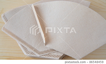 Folded unbleached coffee filter Folded unbleached coffee filter 86548459