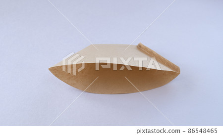 Folded unbleached coffee filter Folded unbleached coffee filter 86548465