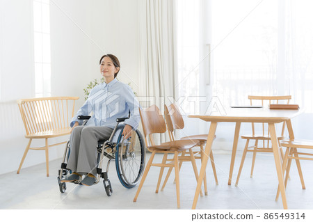 Wheelchair female in her 30s indoors 86549314