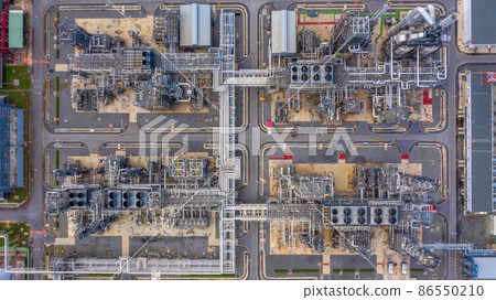 Oil refinery plant at industrial zone, Aerial view oil and gas business petrochemical industrial, Oil refinery factory white oil storage tank and pipeline steel, Ecosystem and healthy environment. 86550210