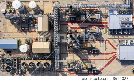 Oil refinery plant at industrial zone, Aerial view oil and gas business petrochemical industrial, Oil refinery factory white oil storage tank and pipeline steel, Ecosystem and healthy environment. Oil refinery plant at industrial zone, Aerial view oil and gas business petrochemical industrial, Oil refinery factory white oil storage tank and pipeline steel, Ecosystem and healthy environment. 86550221