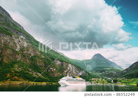 Geirangerfjord, Norway. Aerial View Of Geiranger In Geirangerfjorden In Summer Day. Famous Norwegian Landmark And Popular Destination.Geirangerfjord Norway. Aerial View Of Geiranger In 86552249