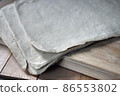 Uncut Dried Tofu Skin, Dried Bean Curd sheet on wooden table. Close up. 86553802