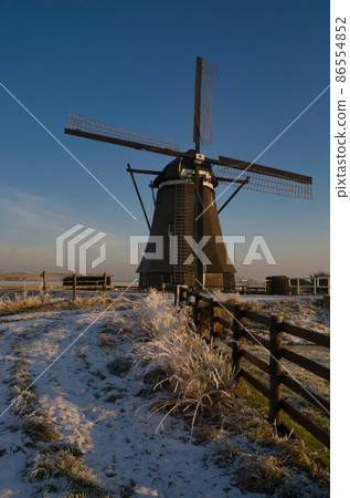 Windmill the Achtkante Molen near the Dutch village Streefkerk 86554852