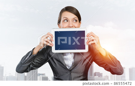 Businesswoman holding tablet computer layout 86555472