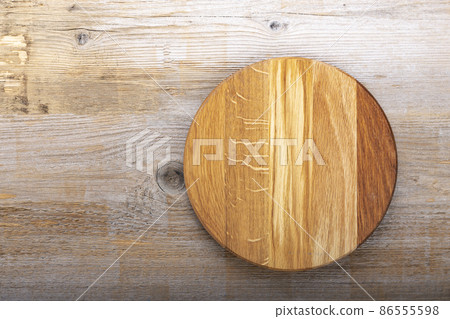 Chopping kitchen boards on a wooden background. Top view flat lay. 86555598