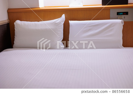 Clean hotel bedroom 86556658